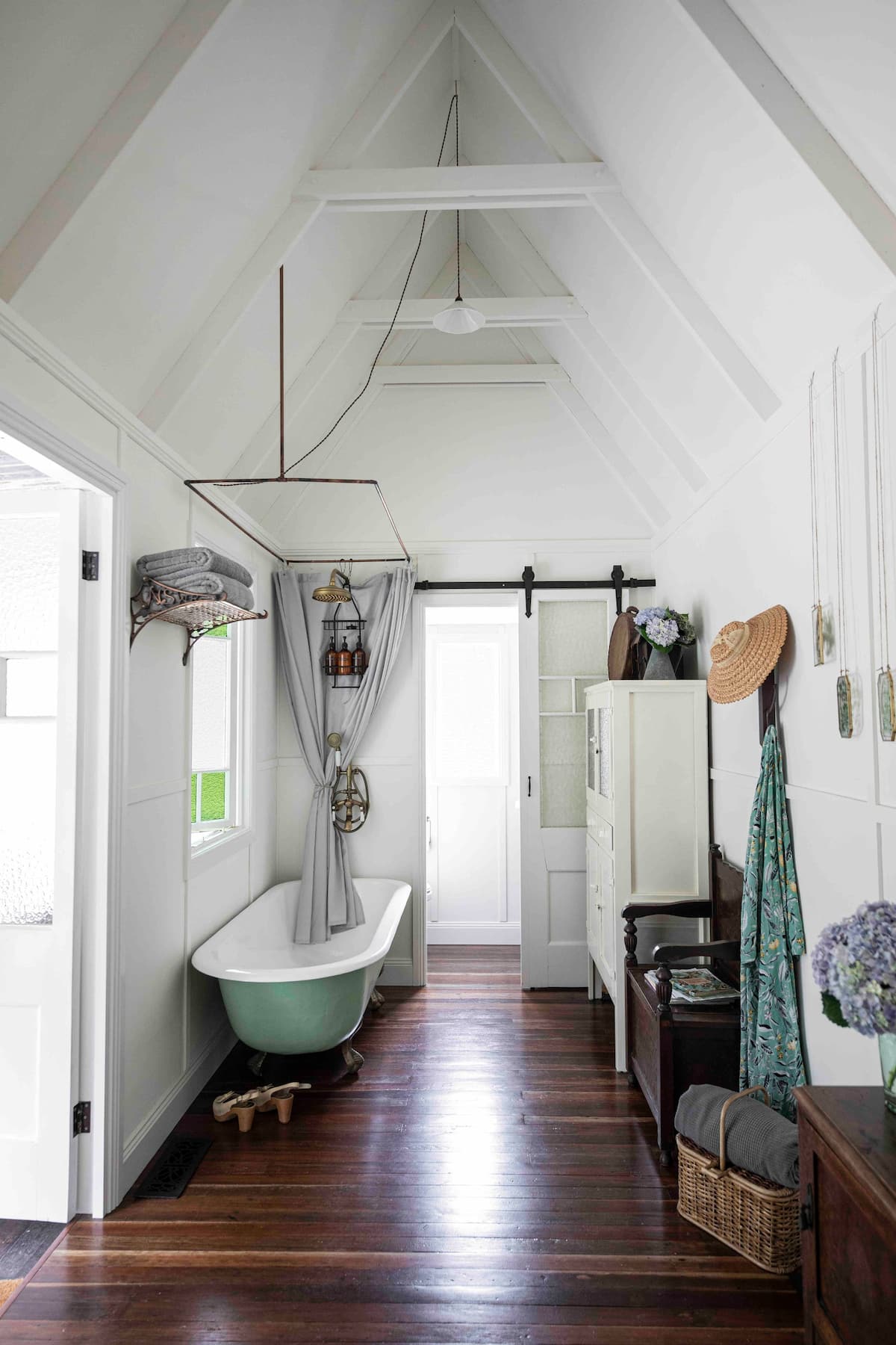 interior of a tiny house with a free standing bath