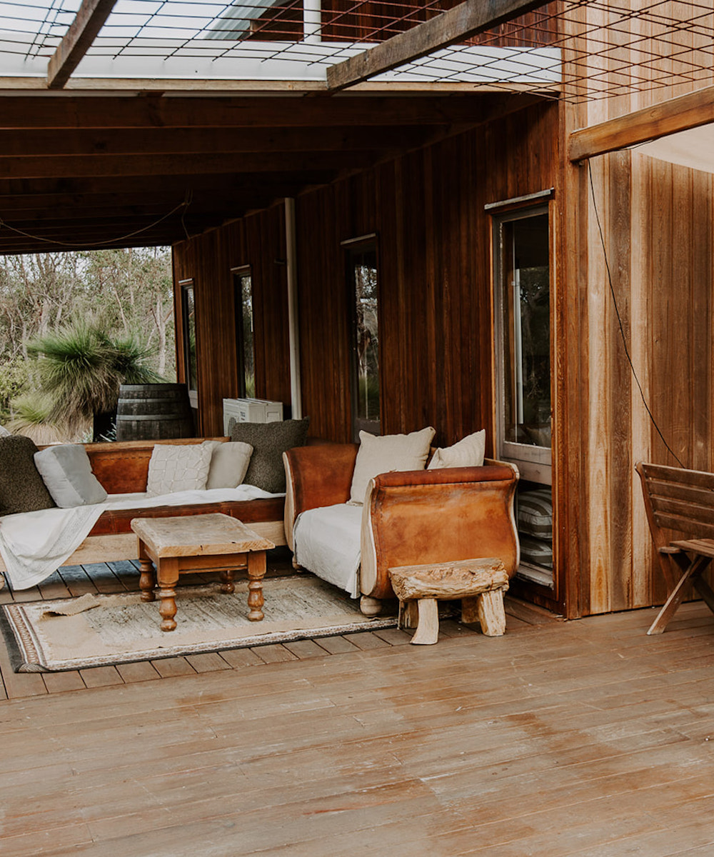 outdoor deck of a tiny cabin in Dunsborough