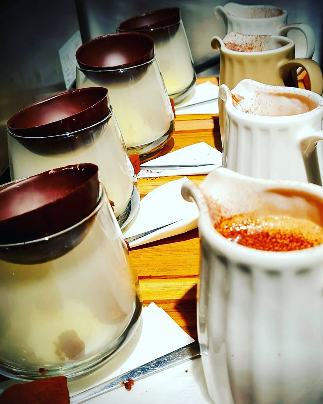 The smoked hot chocolate at Miann all lined up on a tray.