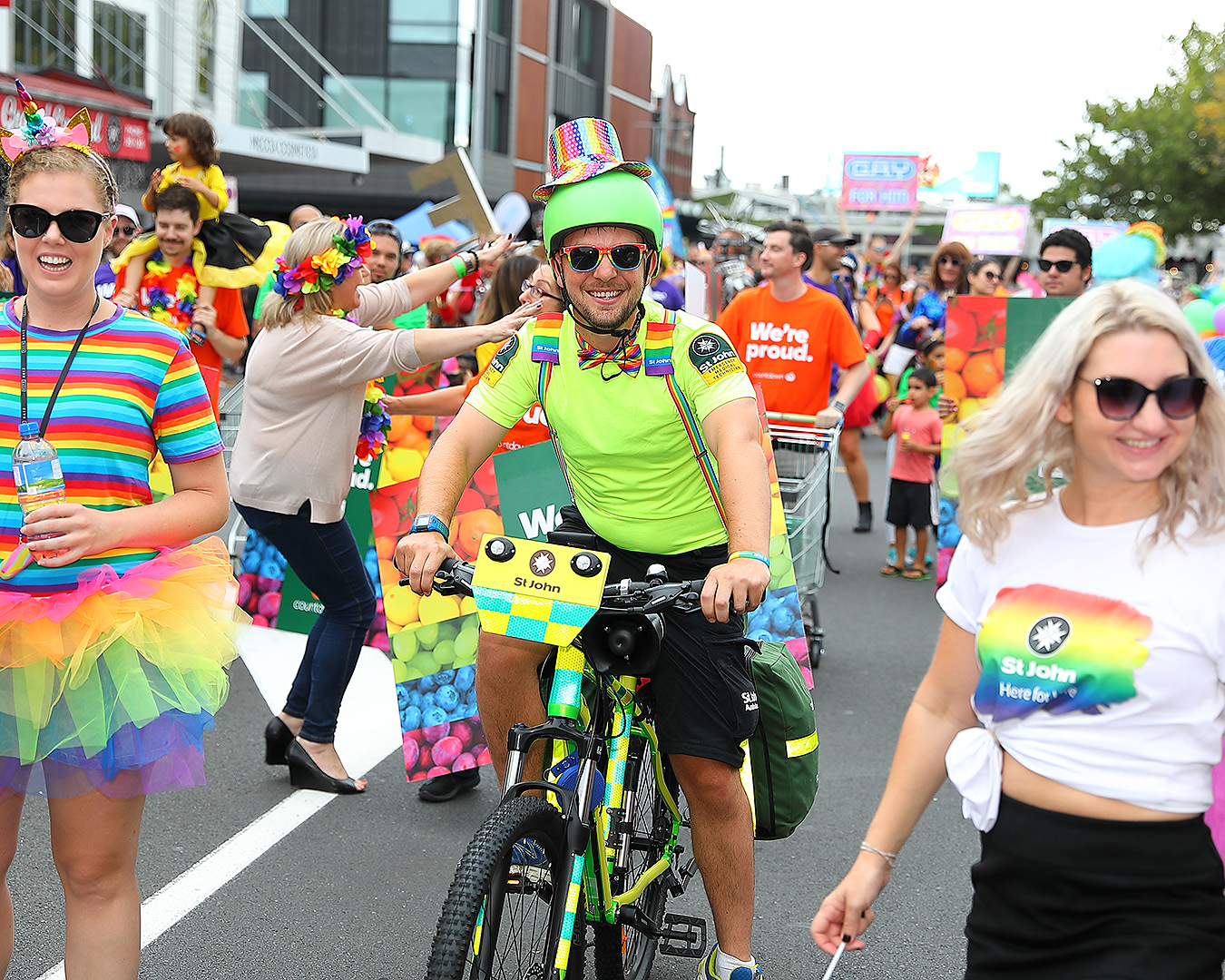 Revellers enjoy the pride rainbow parade.