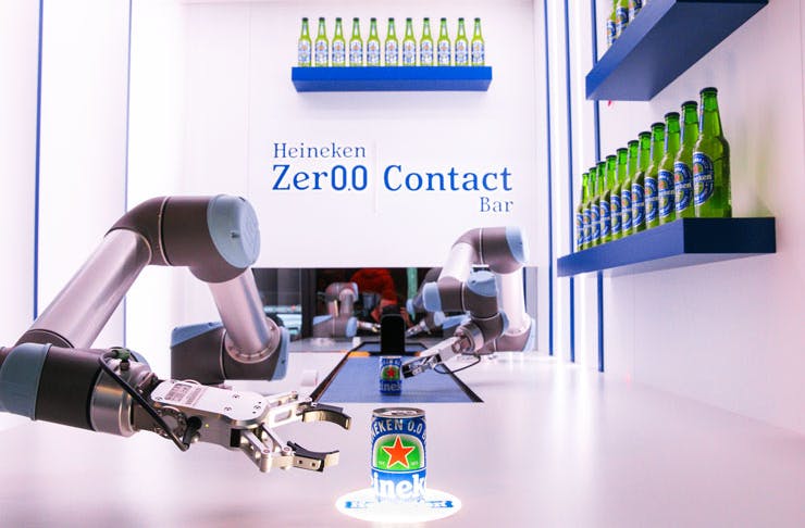 Robotic arms serve alcohol free bar at the Heineken Zero Contact Bar in Sydney. 