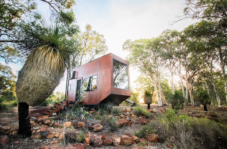 a self-contained tiny house on a hill