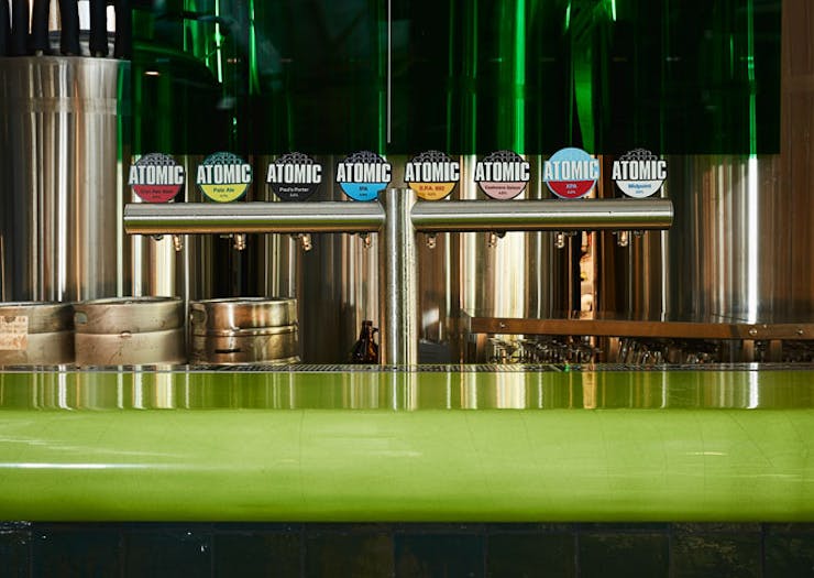 The lime green resin bar at Atomic Beer Project in Redfern, Sydney. 