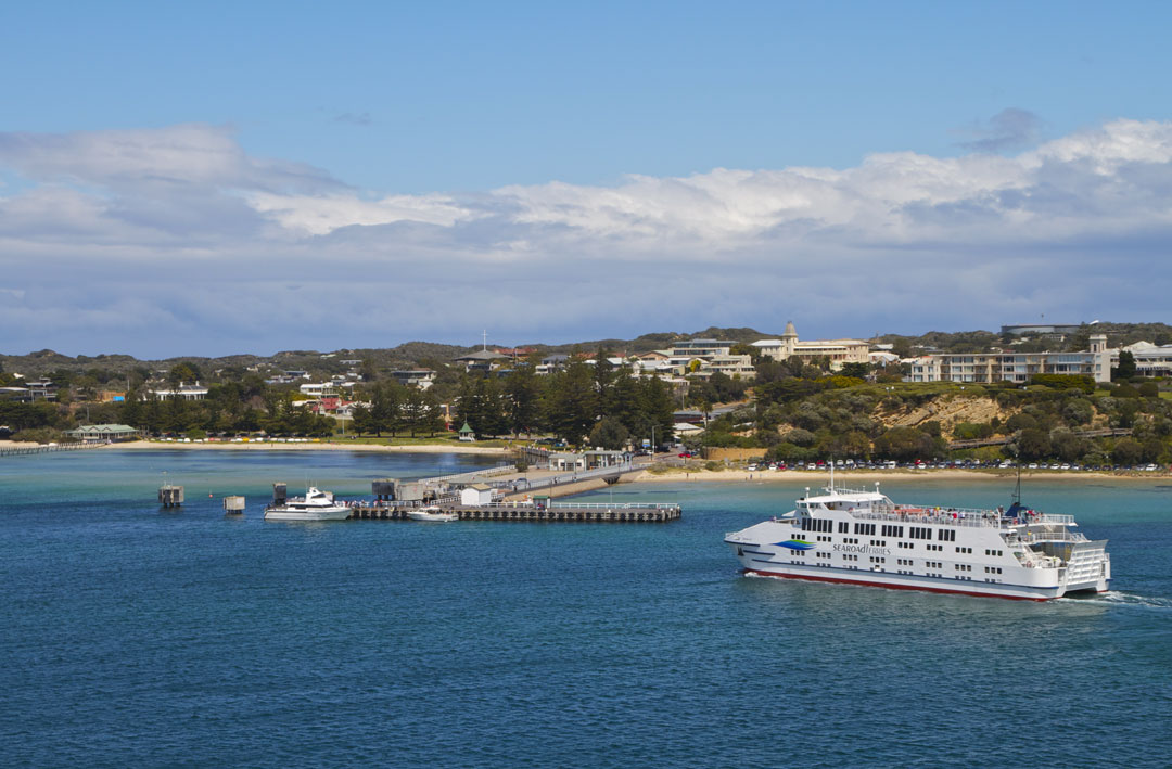 The Searoad Ferry from Sorrento is about to dock in Queenscliff, Victoria. The town can be seen in the background.