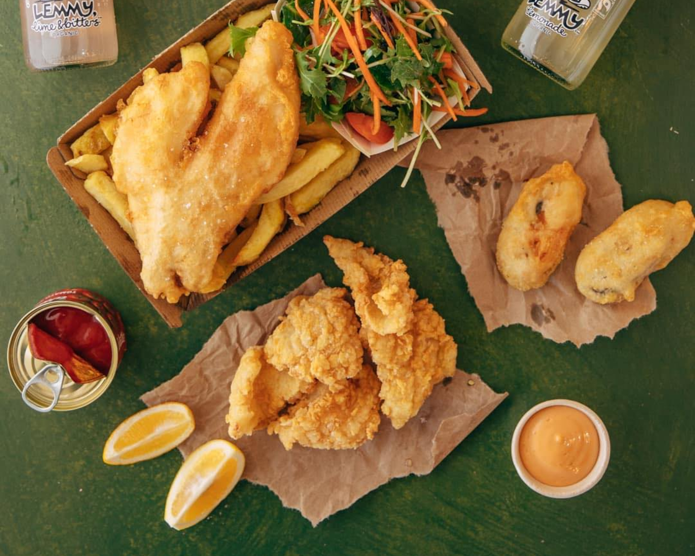 We look down on a delicious spread of fish and chips and fried sides from FishSmith in Herne Bay