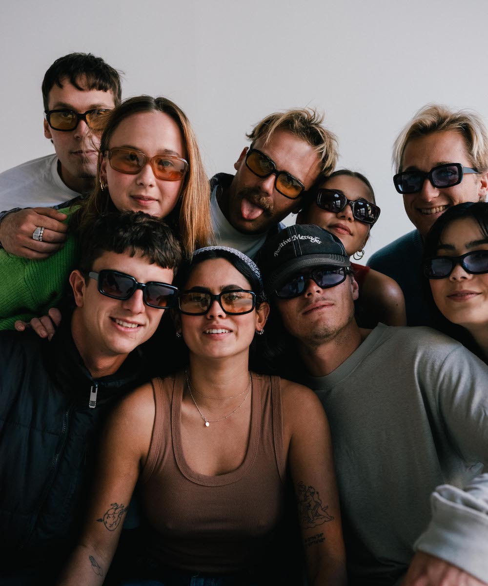a group of young people wearing different sunglasses