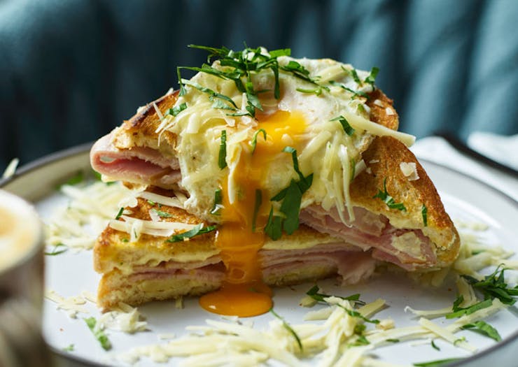 A Croque Madame toastie with a fried egg on top