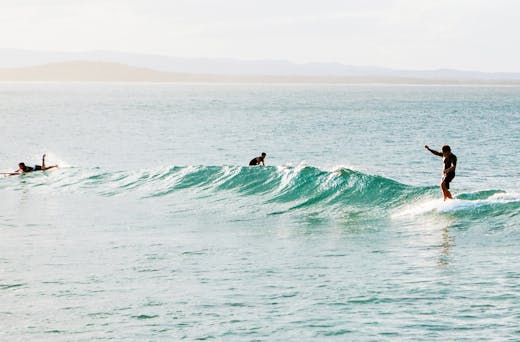 The Best Places You Can Learn To Surf On The Sunshine Coast