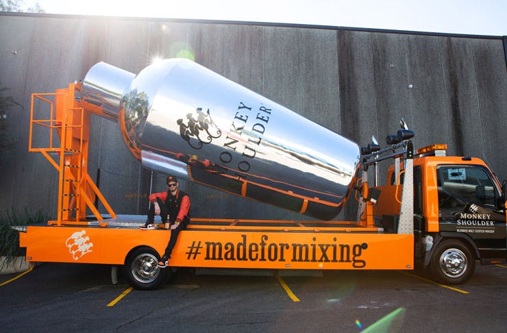 An image of the Monkey Shoulder cocktail mixer truck. A giant silver cocktail mixer attached to the back of a truck, delivering free cocktails from Sydney bars. 