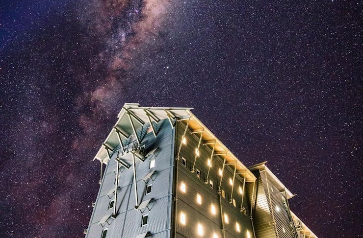 a close up of a hotel at night