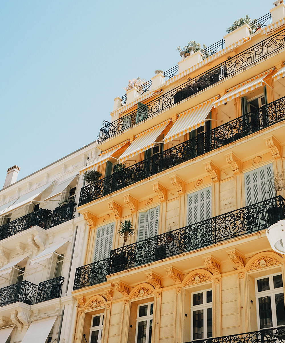 a pastel yellow building in Nice