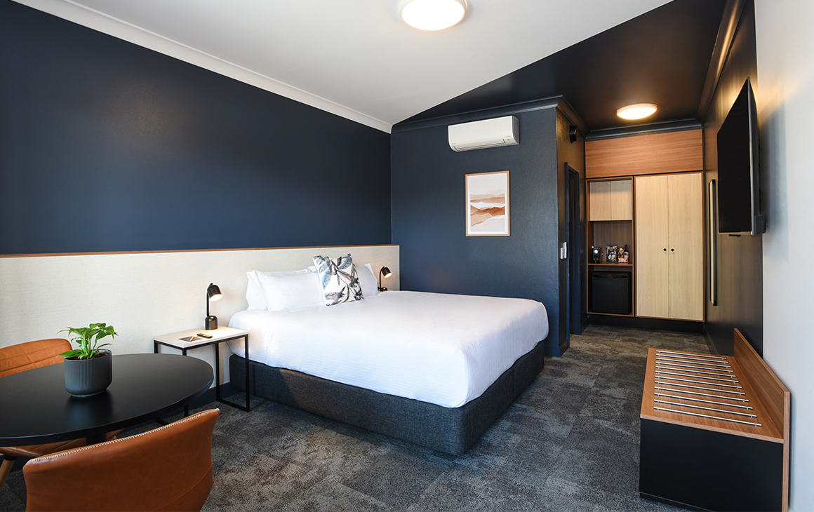 a navy blue interior of a room a HotelMOTEL