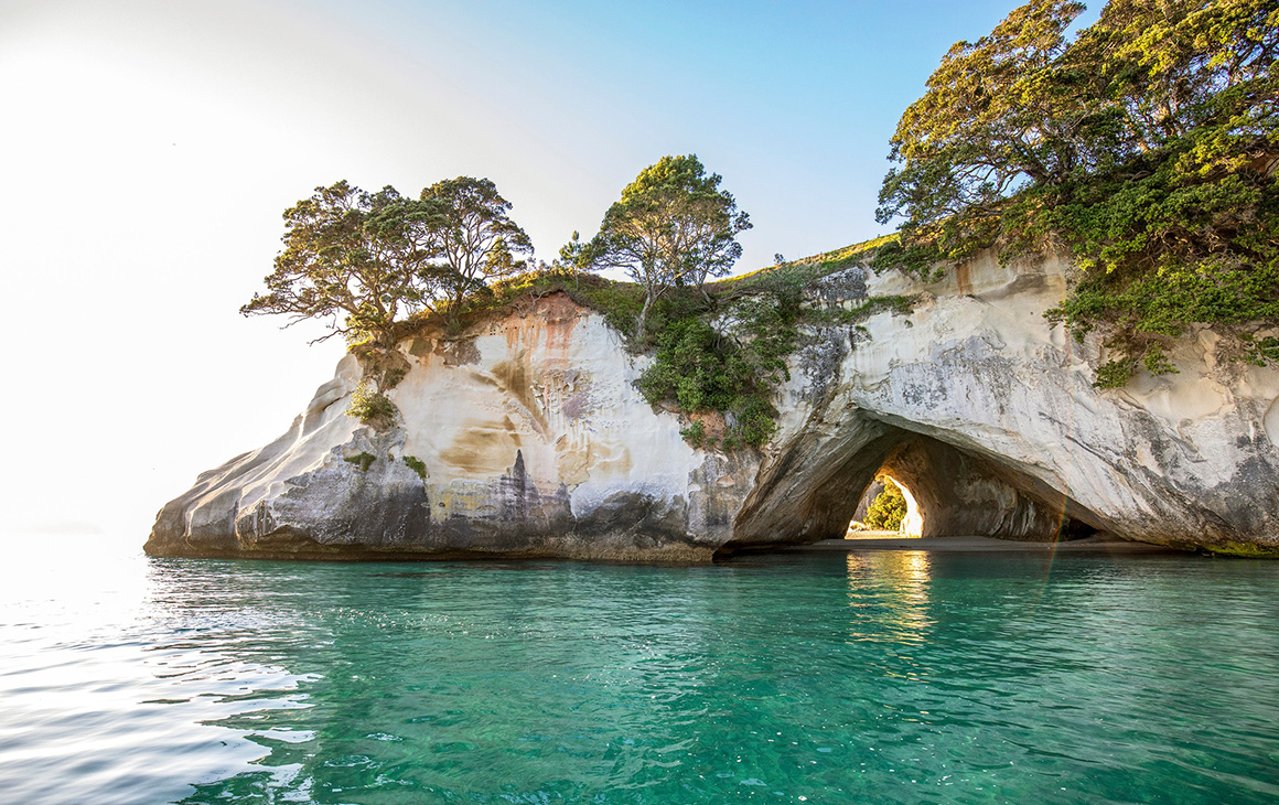 An arched cove in the azure water