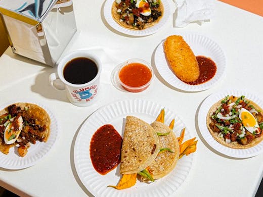 table spread of tacos and mexican breakfast food