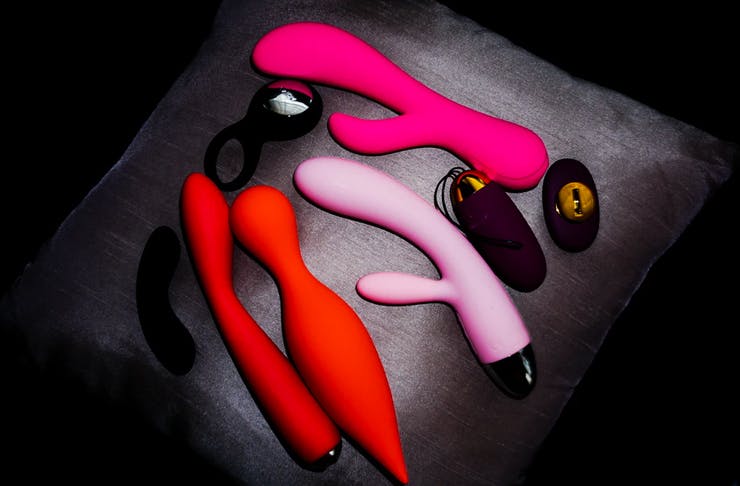 sex toys on a pillow